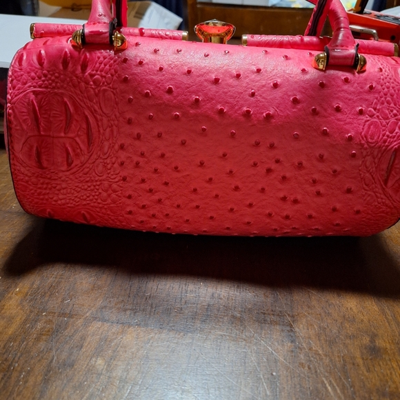 Ruby is a unique handbag that is made of faux leather.  She has a center jeweled - Picture 6 of 7